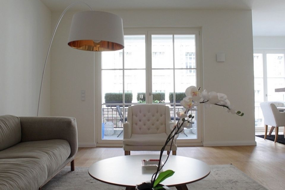 Furnished apartment, living room with arc lamp in Berlin Mitte