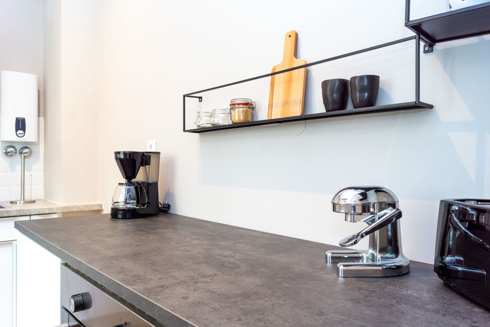 Furnished apartment, kitchen with wall shelf in Berlin Friedrichshain