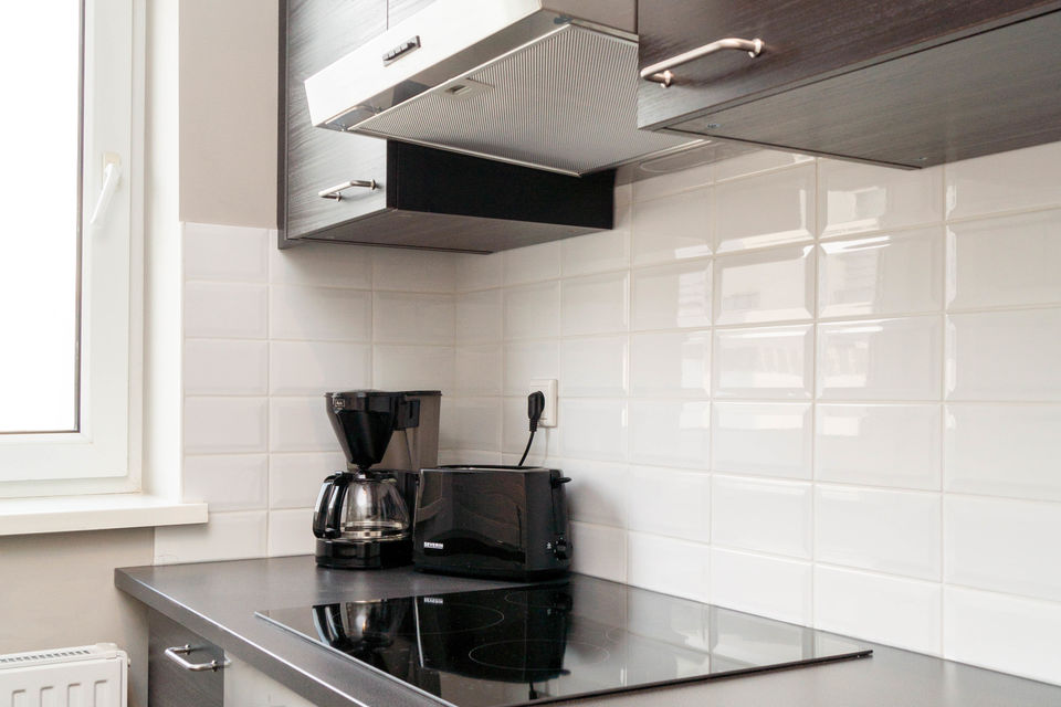 Furnished apartment, kitchen with white tiles in Berlin Schöneberg
