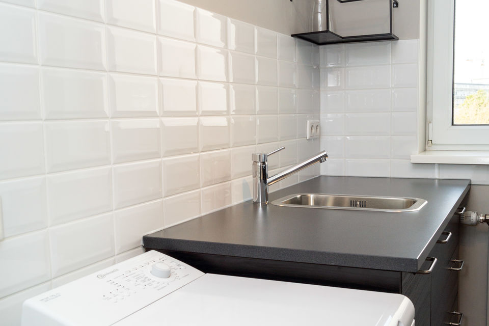 Furnished apartment, kitchen with tiled backsplash in Berlin Schöneberg