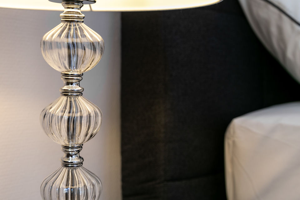 Furnished apartment, living room with glass sphere floor lamp in Berlin Charlottenburg