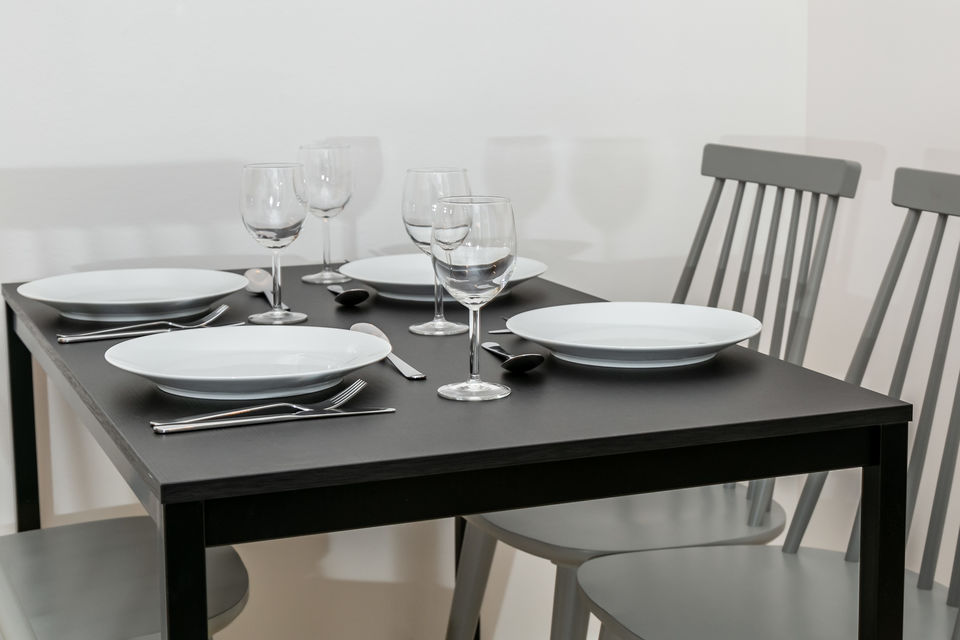 Furnished apartment, dining room with black dining table in Berlin Mitte