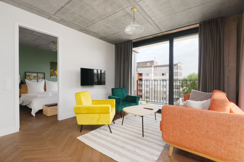 Serviced apartment, living room with balcony view in Berlin Mitte
