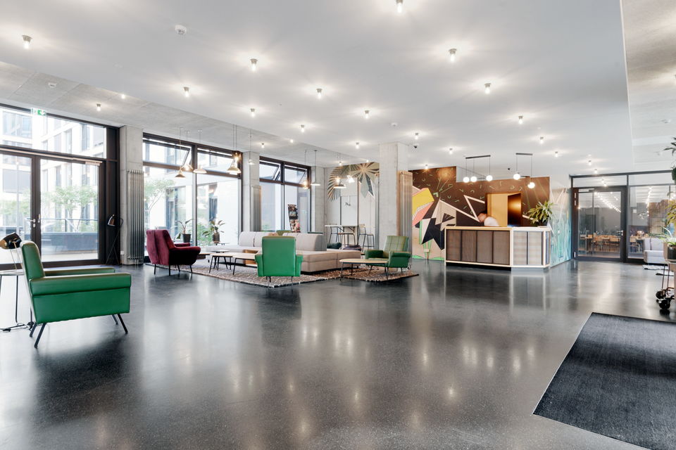 Serviced apartment, living room with upholstered armchair in Berlin Mitte