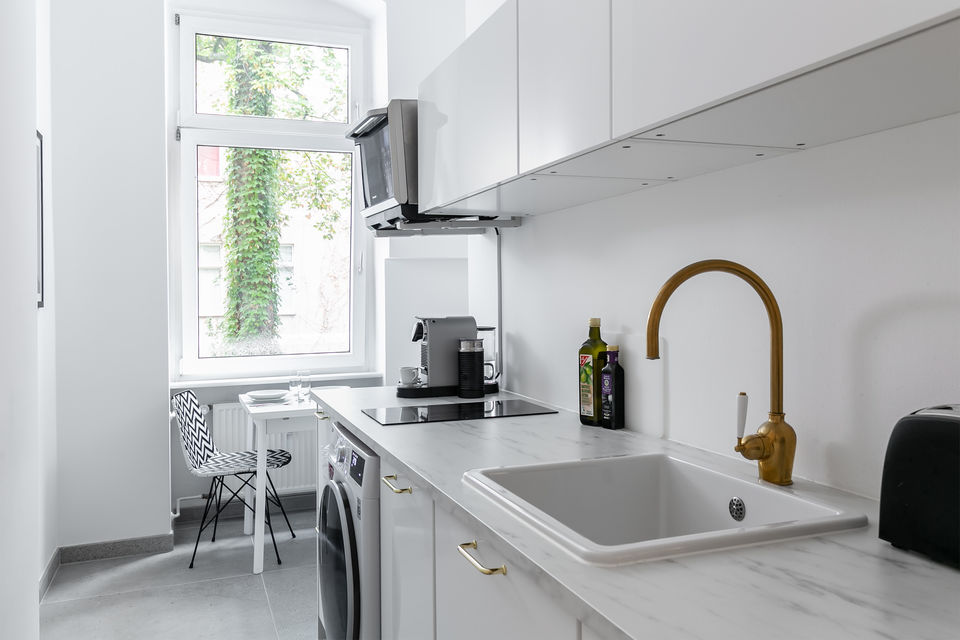 Furnished apartment, kitchen with window view in Berlin Charlottenburg