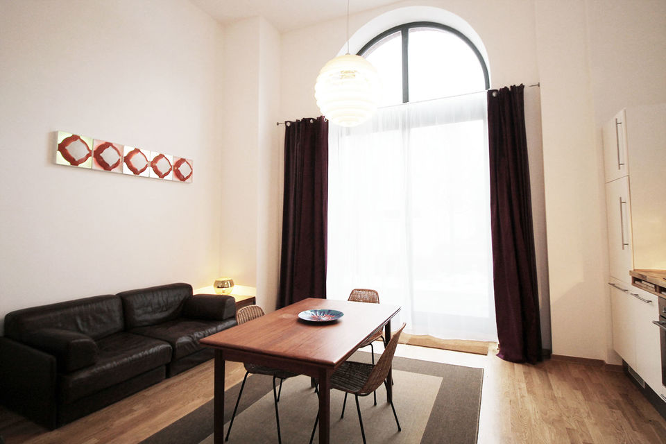 Furnished apartment, living room with arched window in Berlin Kreuzberg