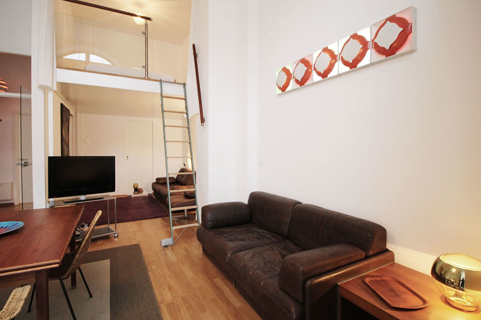 Furnished apartment, living room with loft bed in Berlin Kreuzberg