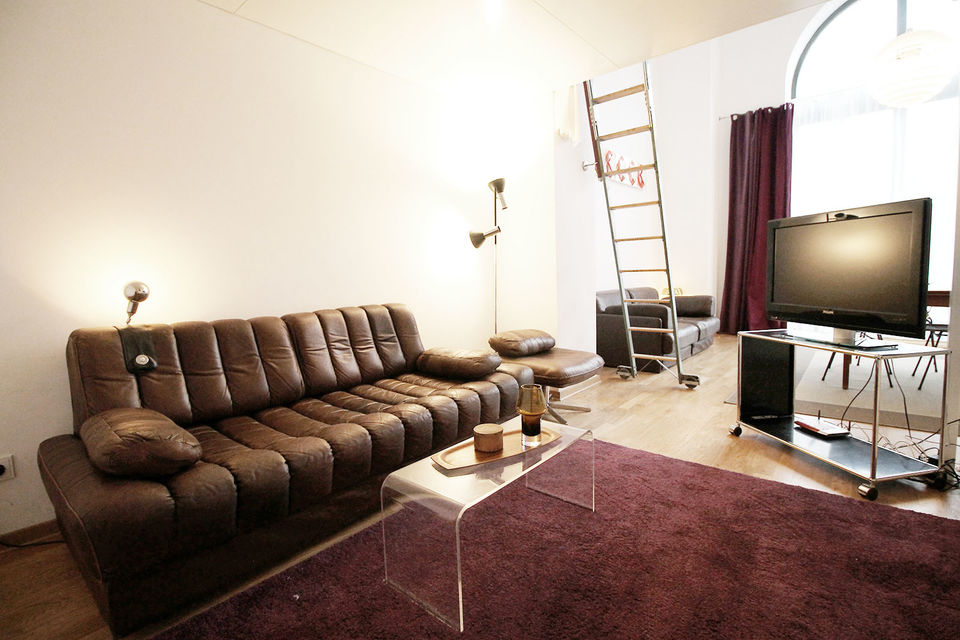 Furnished apartment, living room with designer sofa in Berlin Kreuzberg