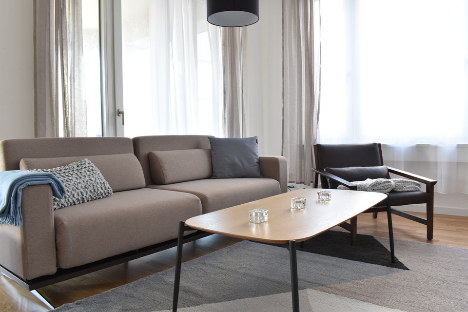 Furnished apartment, living room with expansive windows in Berlin Mitte