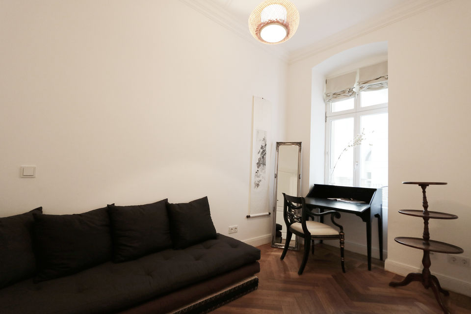 Furnished apartment, living room with grand piano in Berlin Mitte