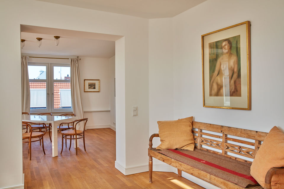Furnished apartment, living room with wooden sofa in Berlin Mitte