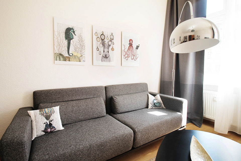 Furnished apartment, living room with arc lamp in Berlin Friedrichshain