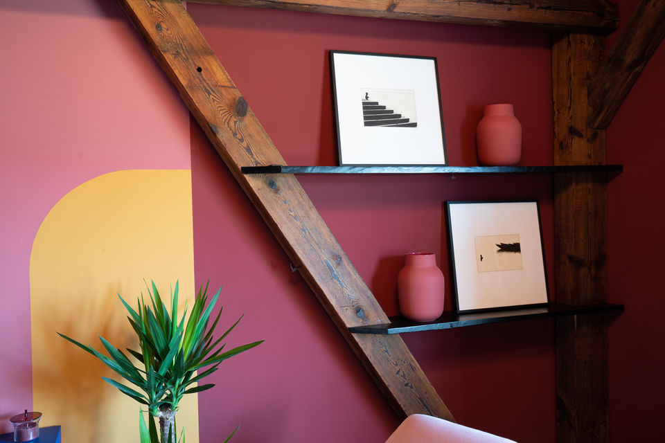 Furnished apartment, living room with colorful wall design in Berlin Mitte