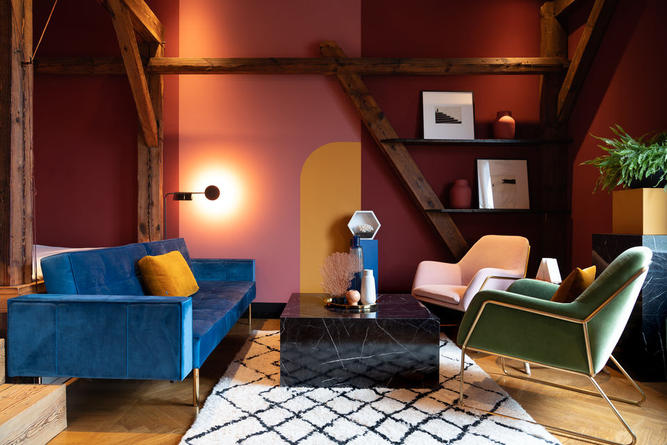 Furnished apartment, living room with colorful wall design in Berlin Mitte
