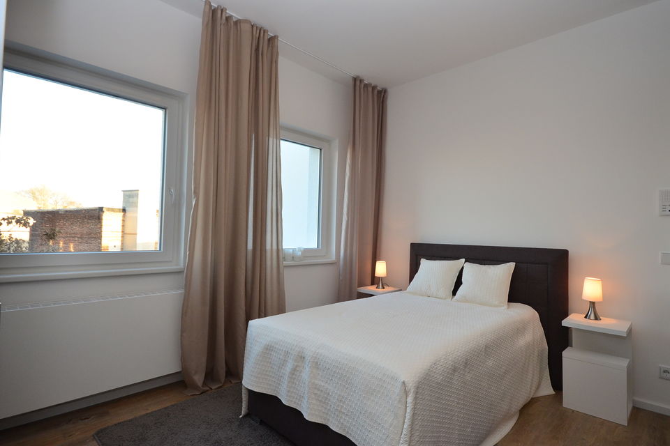Serviced apartment, bedroom 1 with city view in Berlin Mitte