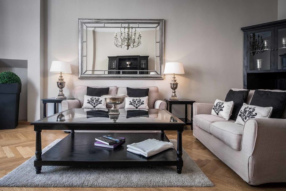 Furnished apartment, living room with designer mirror in Berlin Schöneberg