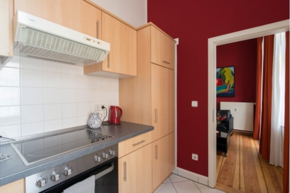 Furnished apartment, kitchen with wooden cabinets in Berlin Mitte