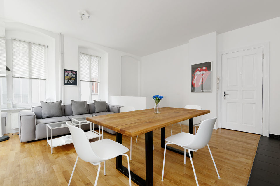 Furnished apartment, dining room with wooden table in Berlin Mitte