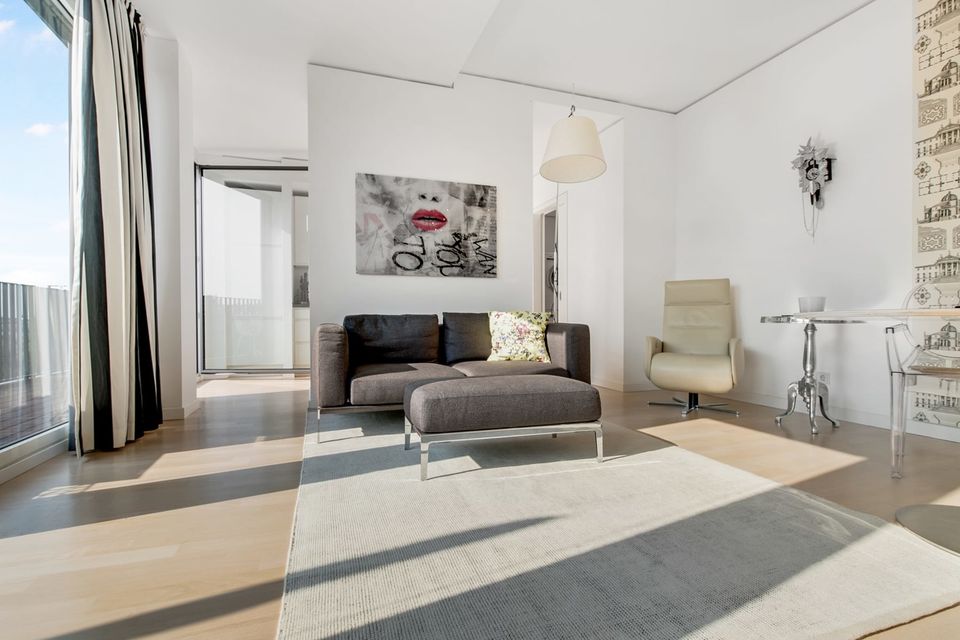 Furnished apartment, living room with panoramic windows in Berlin Mitte