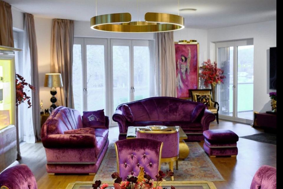 Luxury apartment, living room with velvet sofas in Berlin Mitte