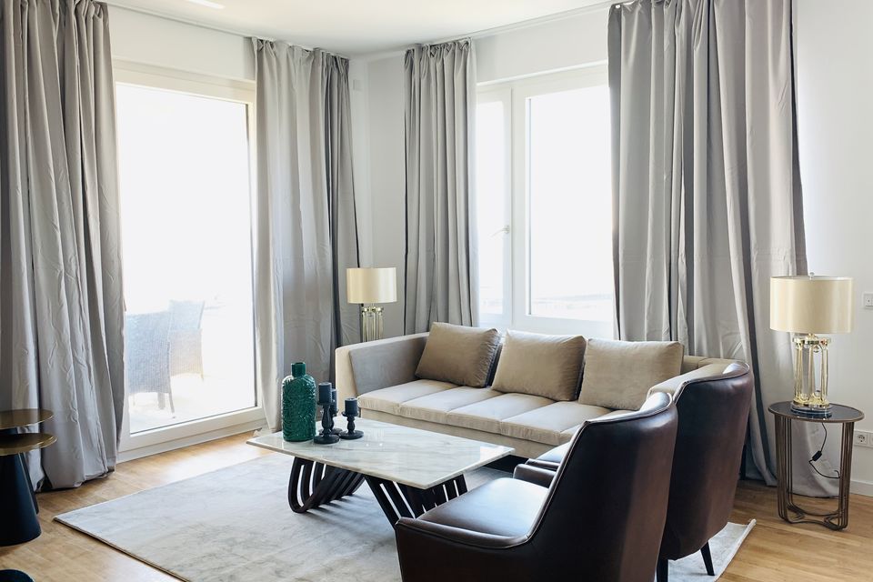 Furnished apartment, living room with panoramic windows in Berlin Mitte