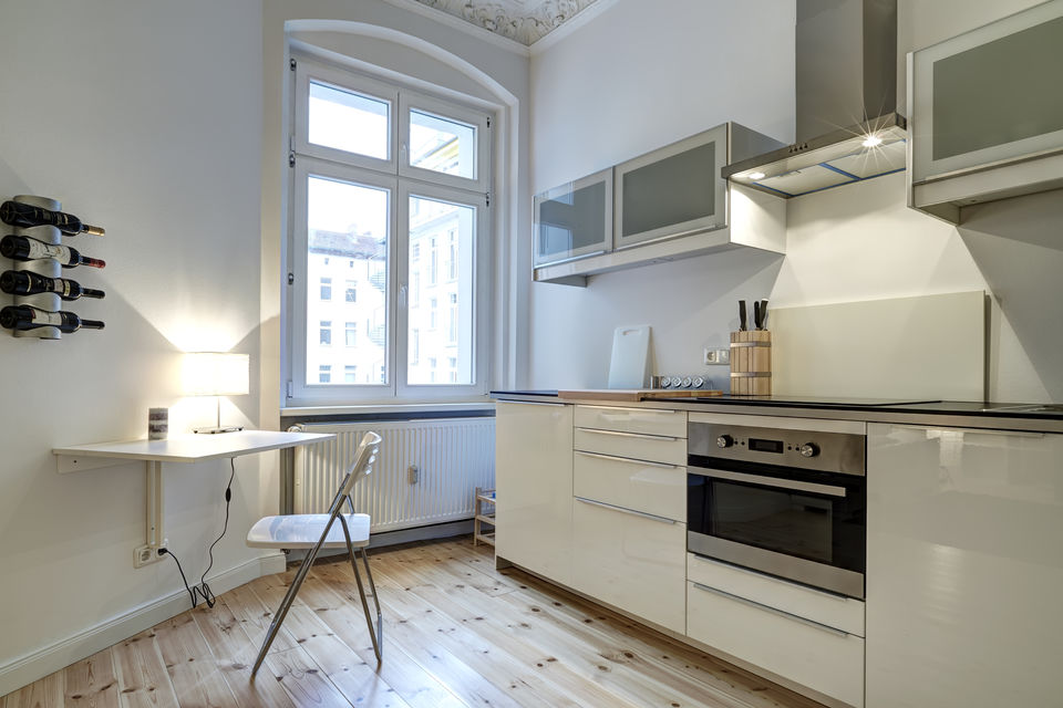 Furnished apartment, kitchen with large windows in Berlin Kreuzberg