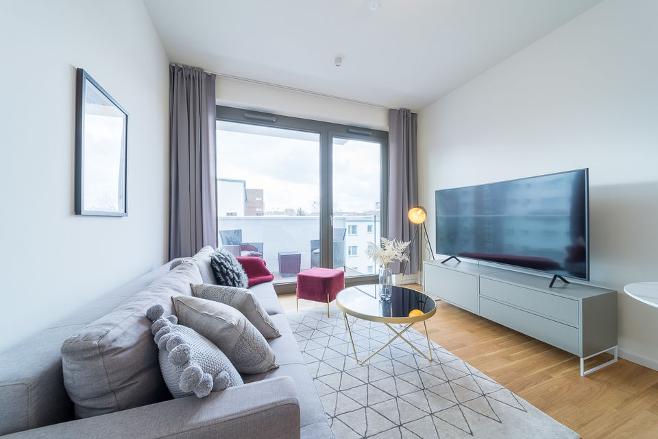 Furnished apartment, living room with city view in Berlin Mitte
