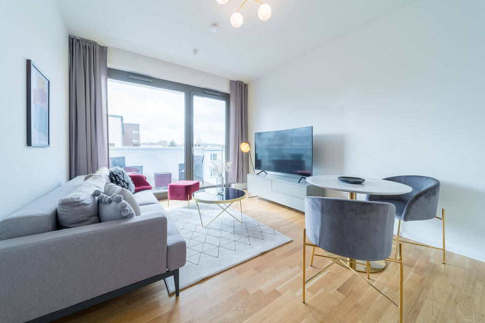 Furnished apartment, living room with panoramic windows in Berlin Mitte