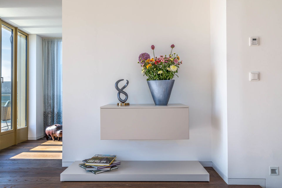 Furnished apartment, living room with wall-mounted shelf in Berlin Mitte
