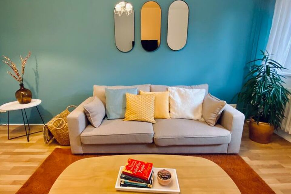 Furnished apartment, living room with accent wall in Berlin Spandau