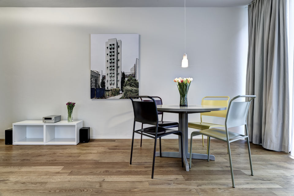 Furnished apartment, dining room with modern dining table in Berlin Friedrichshain