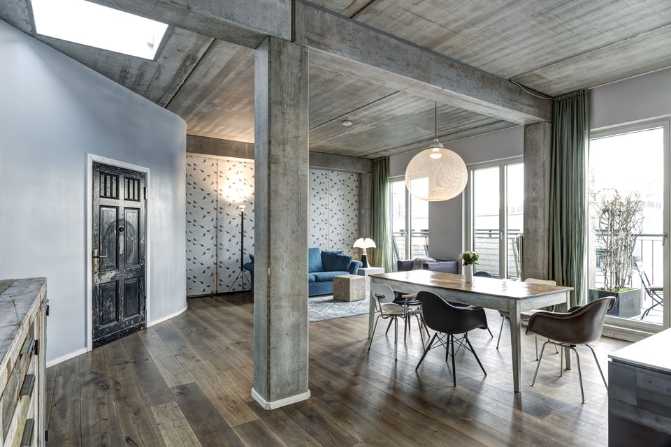 Furnished apartment, living room with exposed concrete ceiling in Berlin Mitte