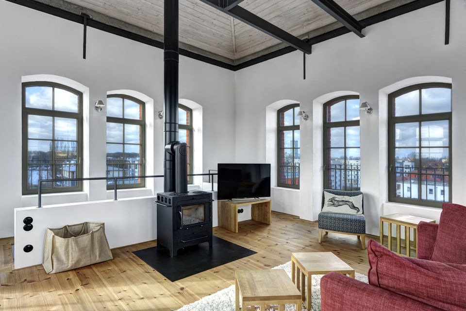 Furnished house, living room with wood stove in Berlin Rummelsburg