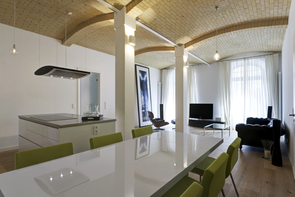 Furnished apartment, living room with columns and brick ceiling in Berlin Mitte
