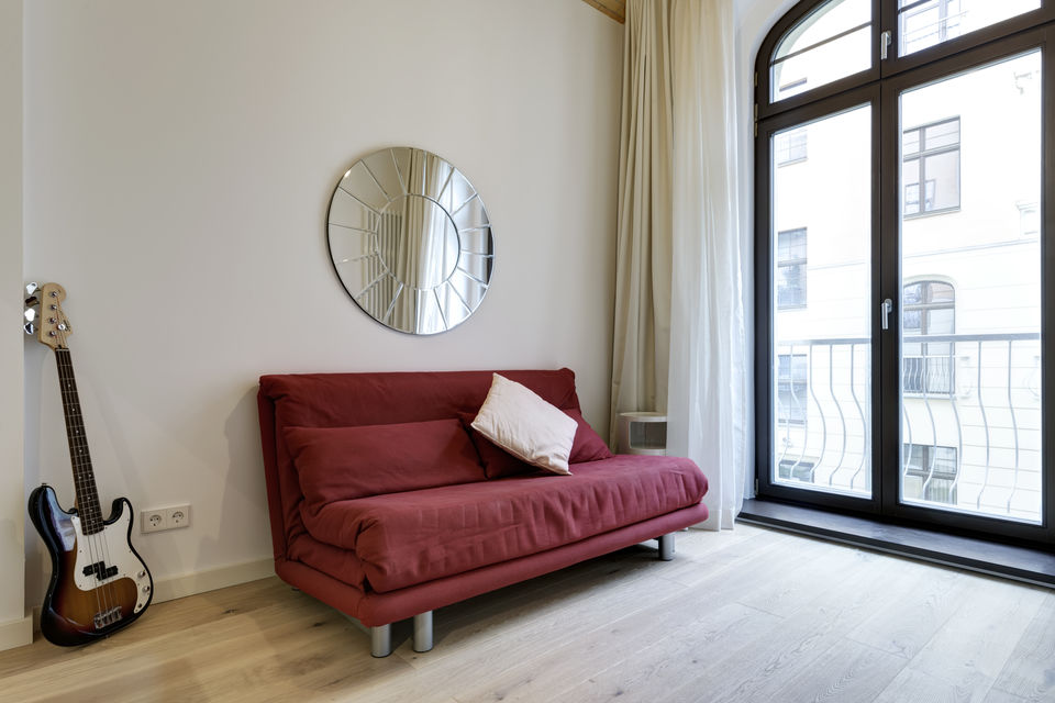 Furnished apartment, living room with designer sofa in Berlin Mitte