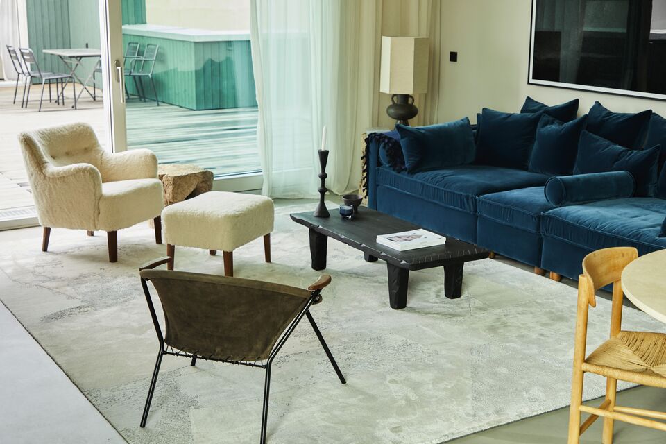 Furnished apartment, living room with blue sofa in Berlin Wedding