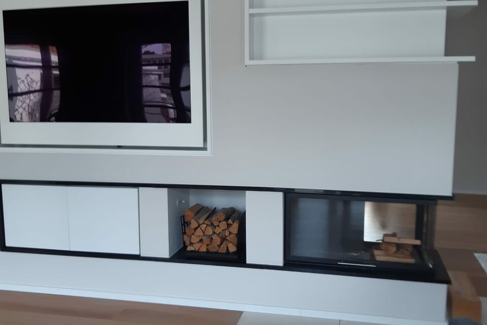 Furnished apartment, living room with modern fireplace in Munich Maxvorstadt