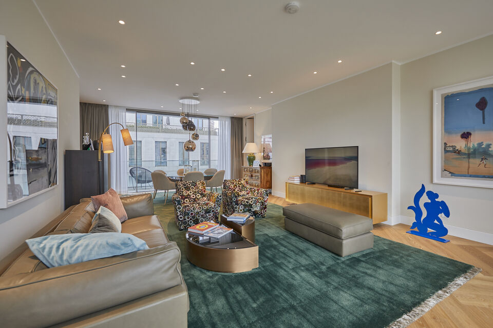 Serviced apartment, living room with panoramic windows in Berlin Mitte