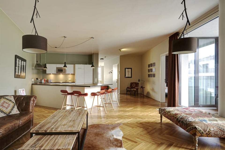 Serviced apartment, living room with wooden parquet flooring in Berlin Mitte