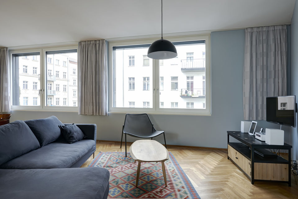 Serviced apartment, living room with city view in Berlin Mitte