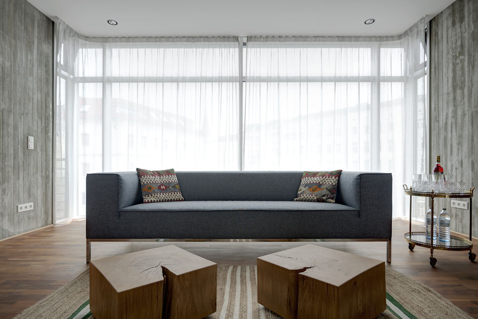 Furnished apartment, living room with floor-to-ceiling windows in Berlin Mitte