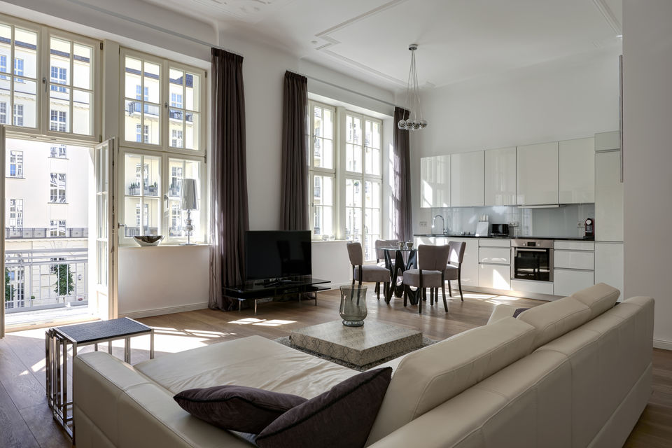 Furnished apartment, living room with high ceilings and large windows in Berlin Charlottenburg