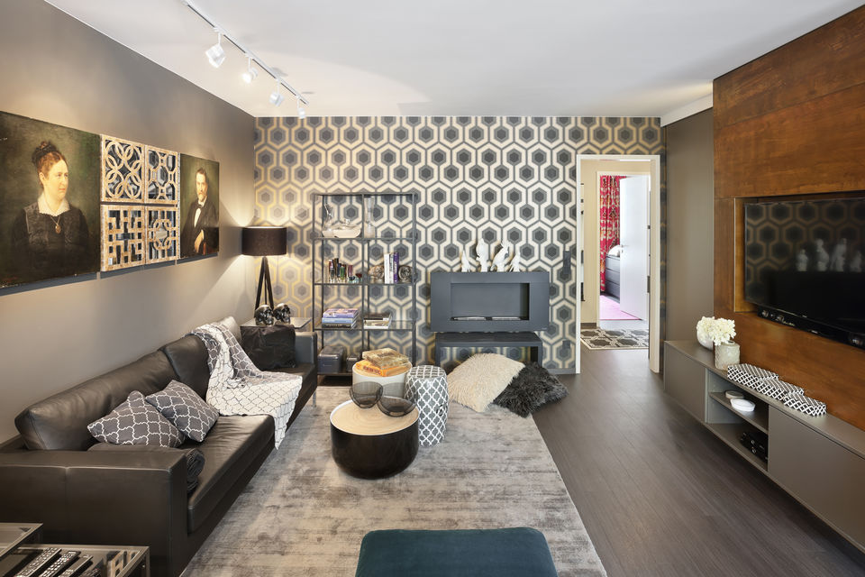 Furnished apartment, living room with geometric accent wallpaper in Berlin Schöneberg
