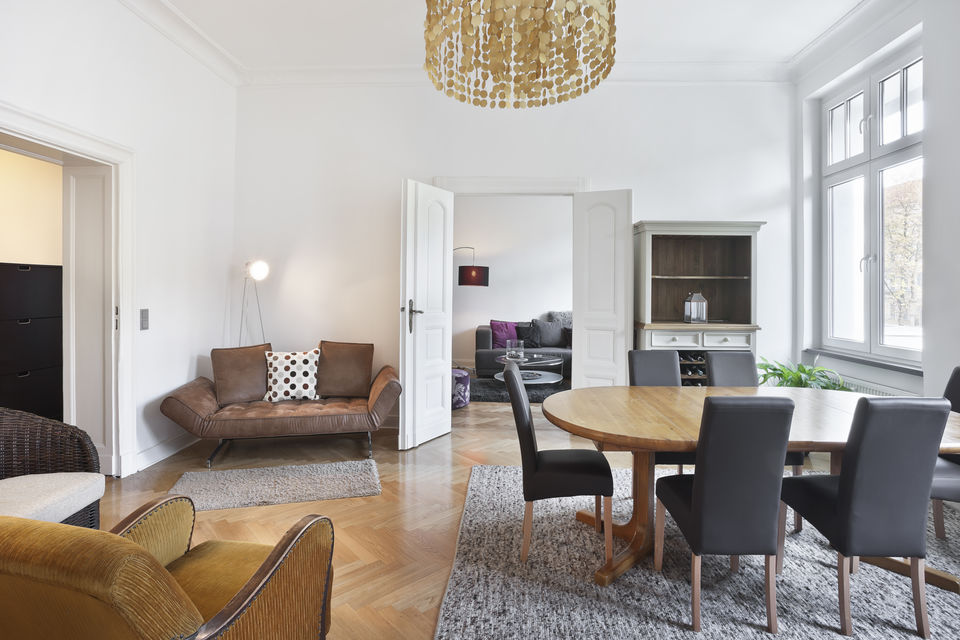 Furnished apartment, dining room with wooden table in Berlin Prenzlauer Berg