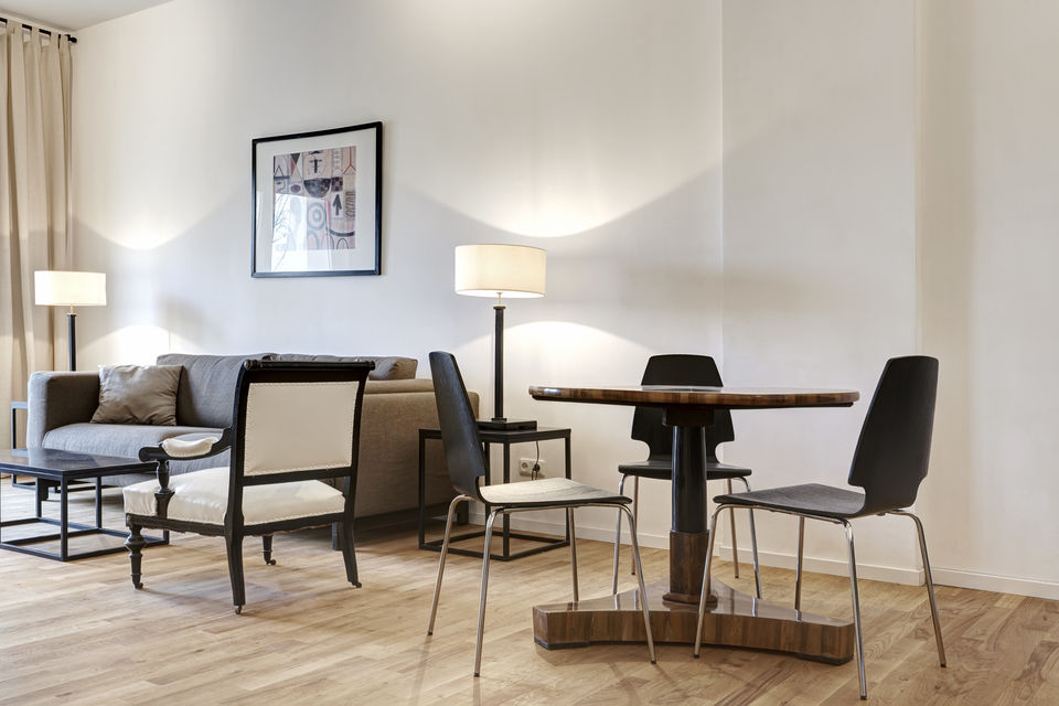 Furnished apartment, living room with modern dining table in Berlin Kreuzberg