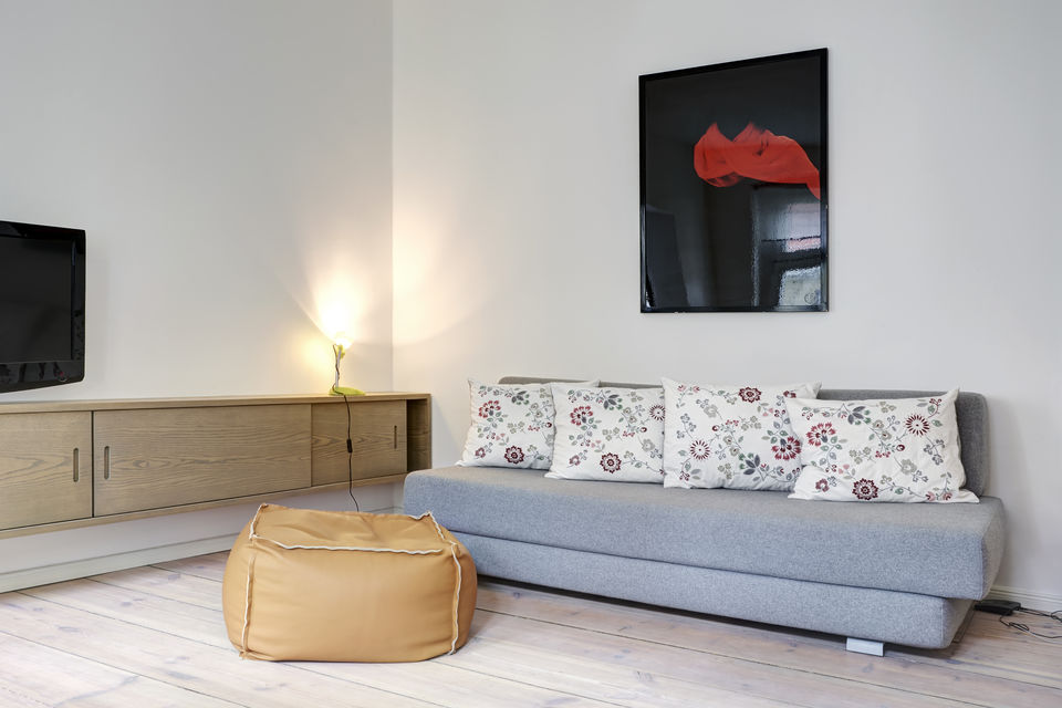 Furnished apartment, living room with designer sofa in Berlin Mitte