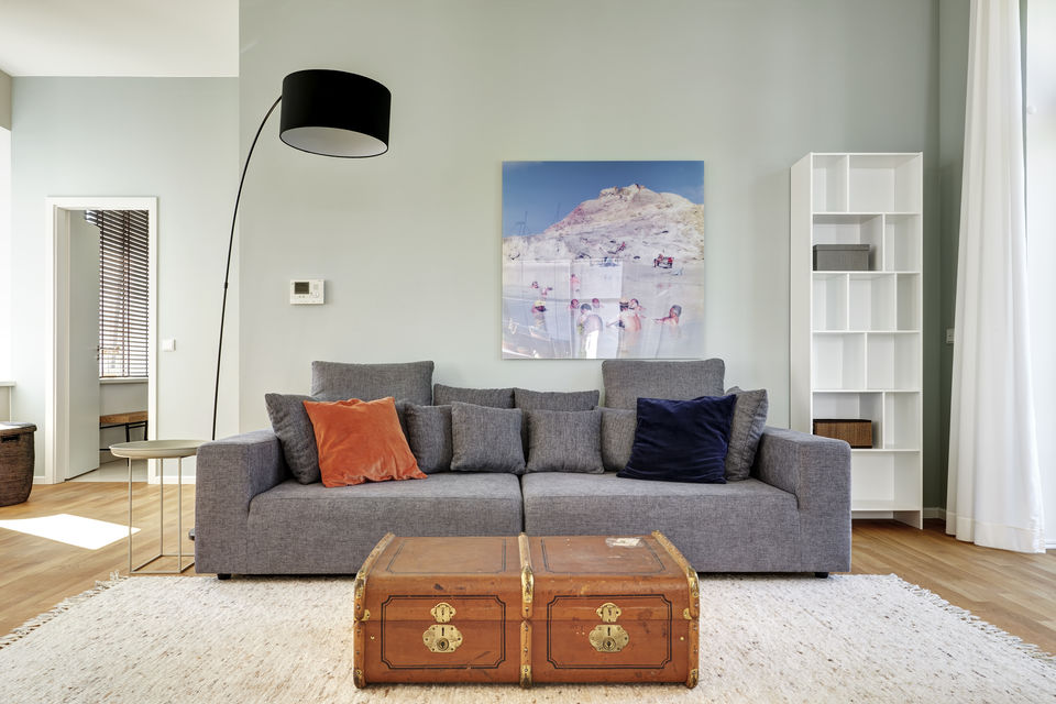 Furnished apartment, living room with designer sofa in Berlin Weißensee