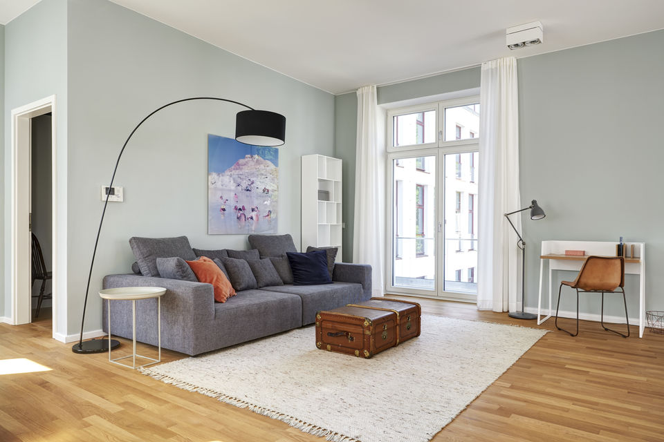 Furnished apartment, living room with arc lamp in Berlin Weißensee