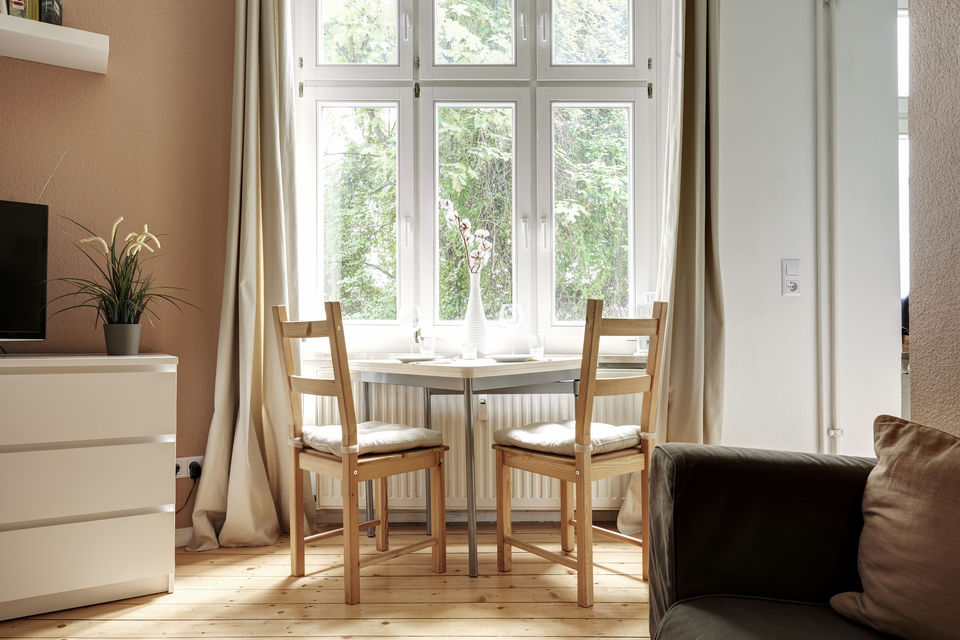 Furnished apartment, living room with large windows in Berlin Prenzlauer Berg