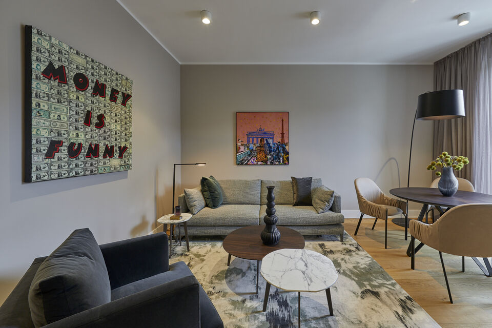 Serviced apartment, living room with contemporary art installation in Berlin Mitte